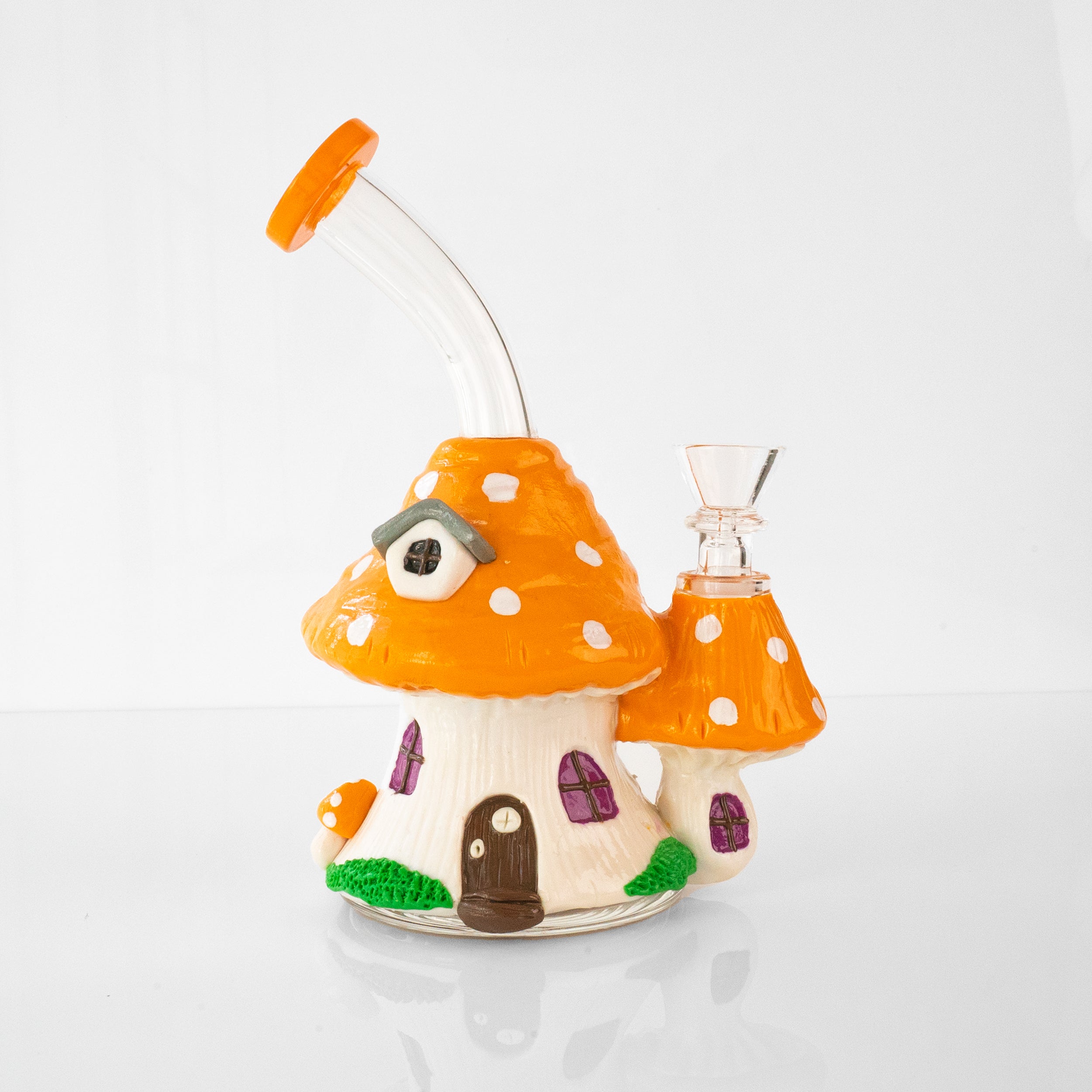 Cottage bong, orange mushroom house glass bong with red-capped toadstools, front view