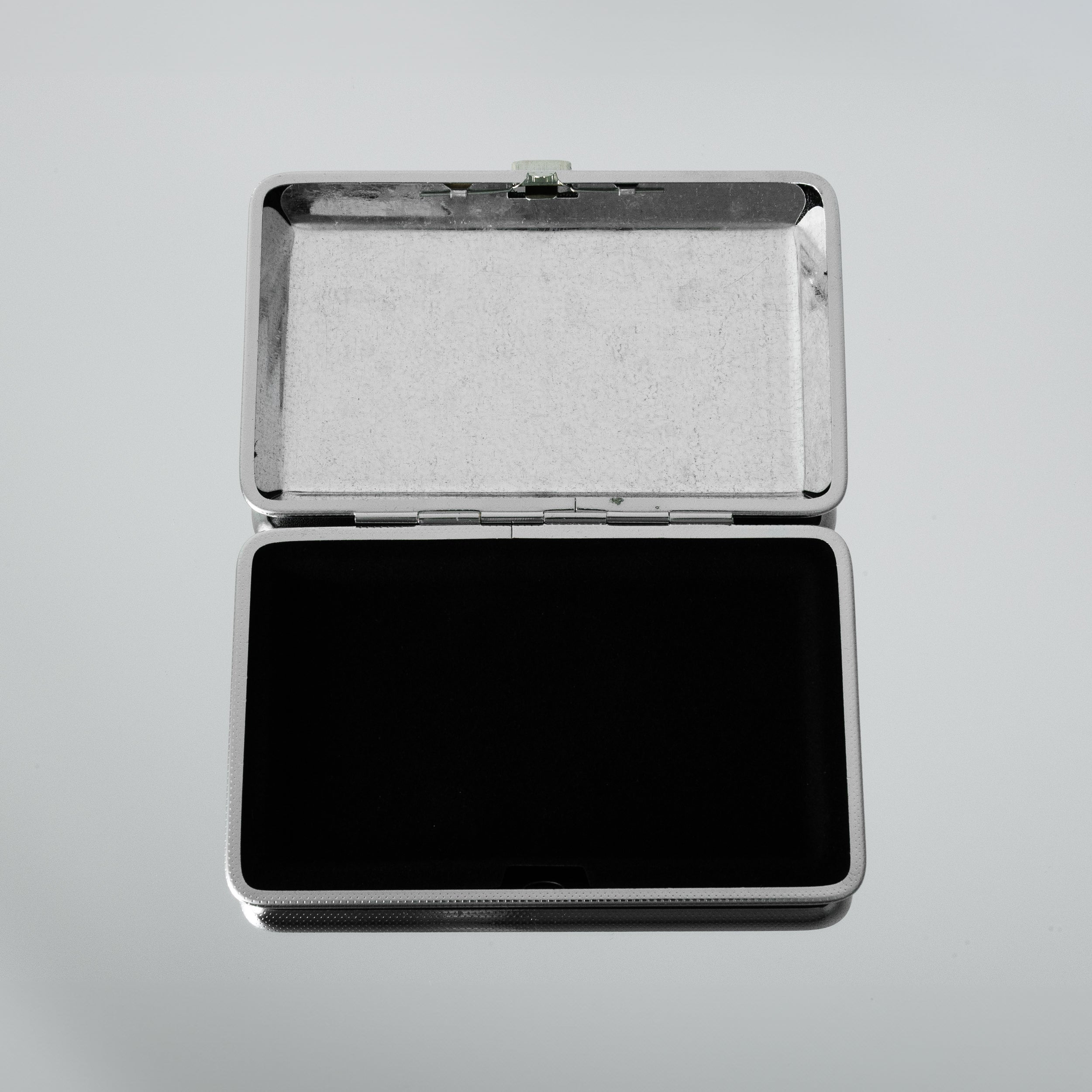 The Lovers joint case by Cannabitches, open silver metal case with empty interior