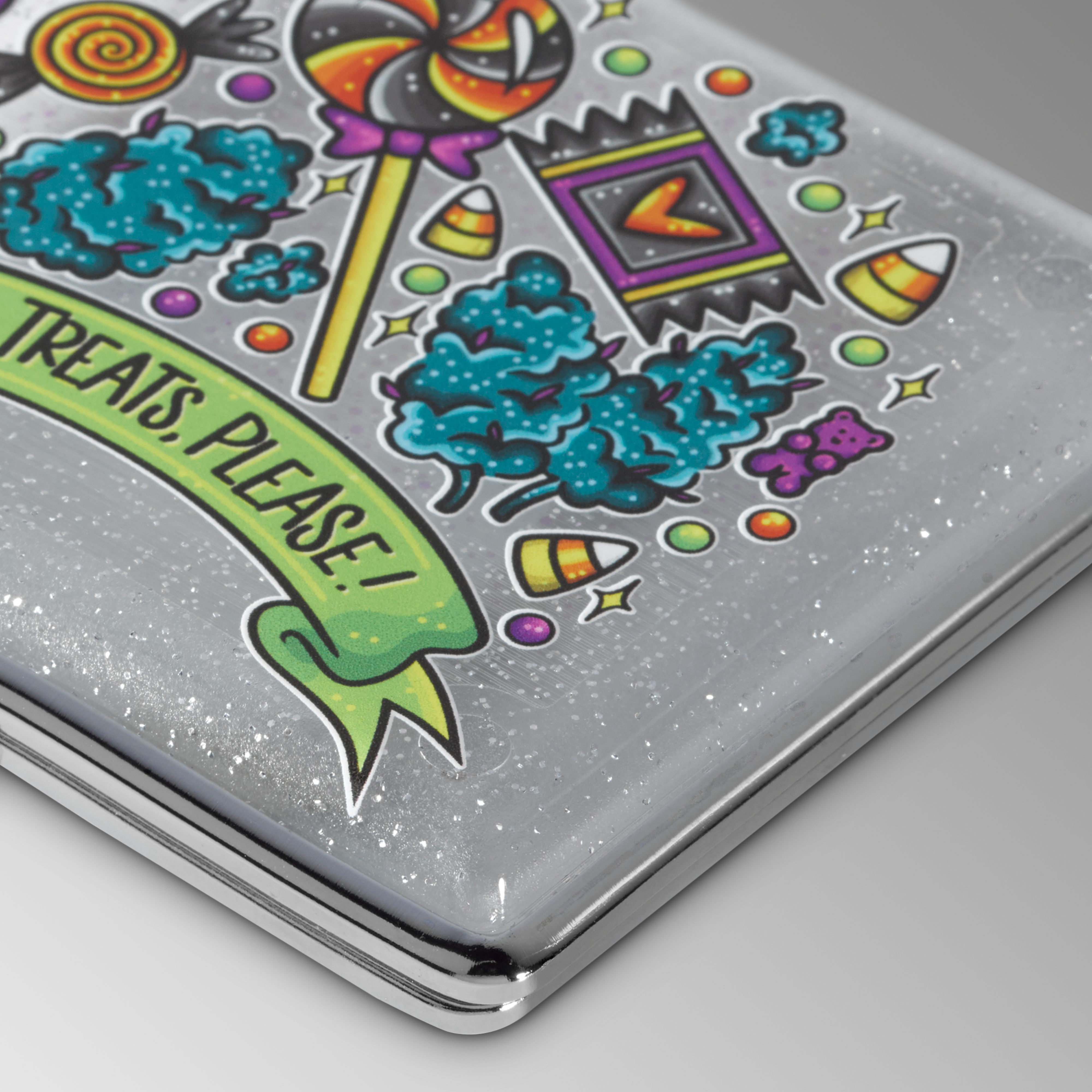 Just Treats Please Halloween stash case by Tarryn Ann, close-up of the candy artwork