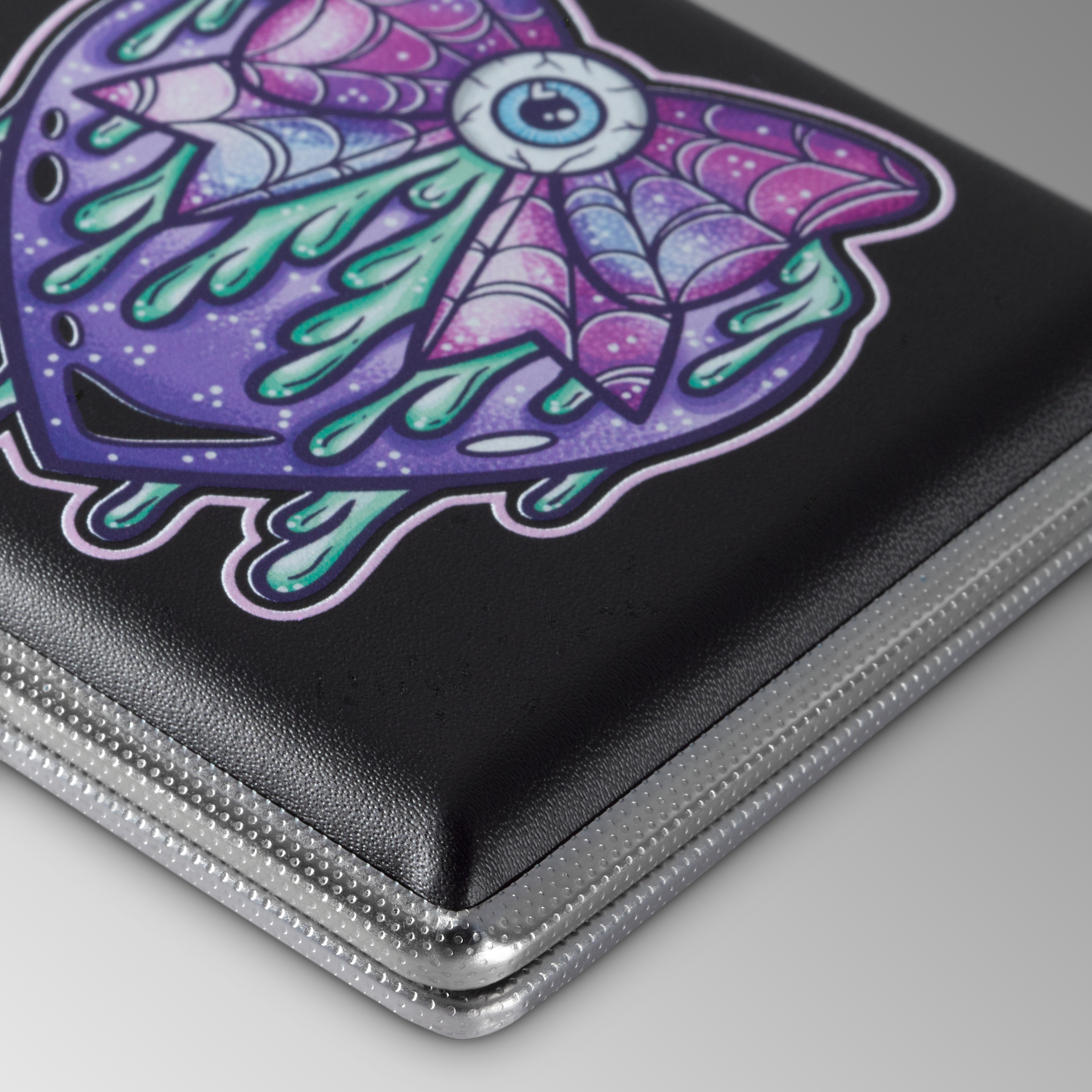 Black Eye Love You to Death stash case by Cannabitches, angled view of skeleton lid