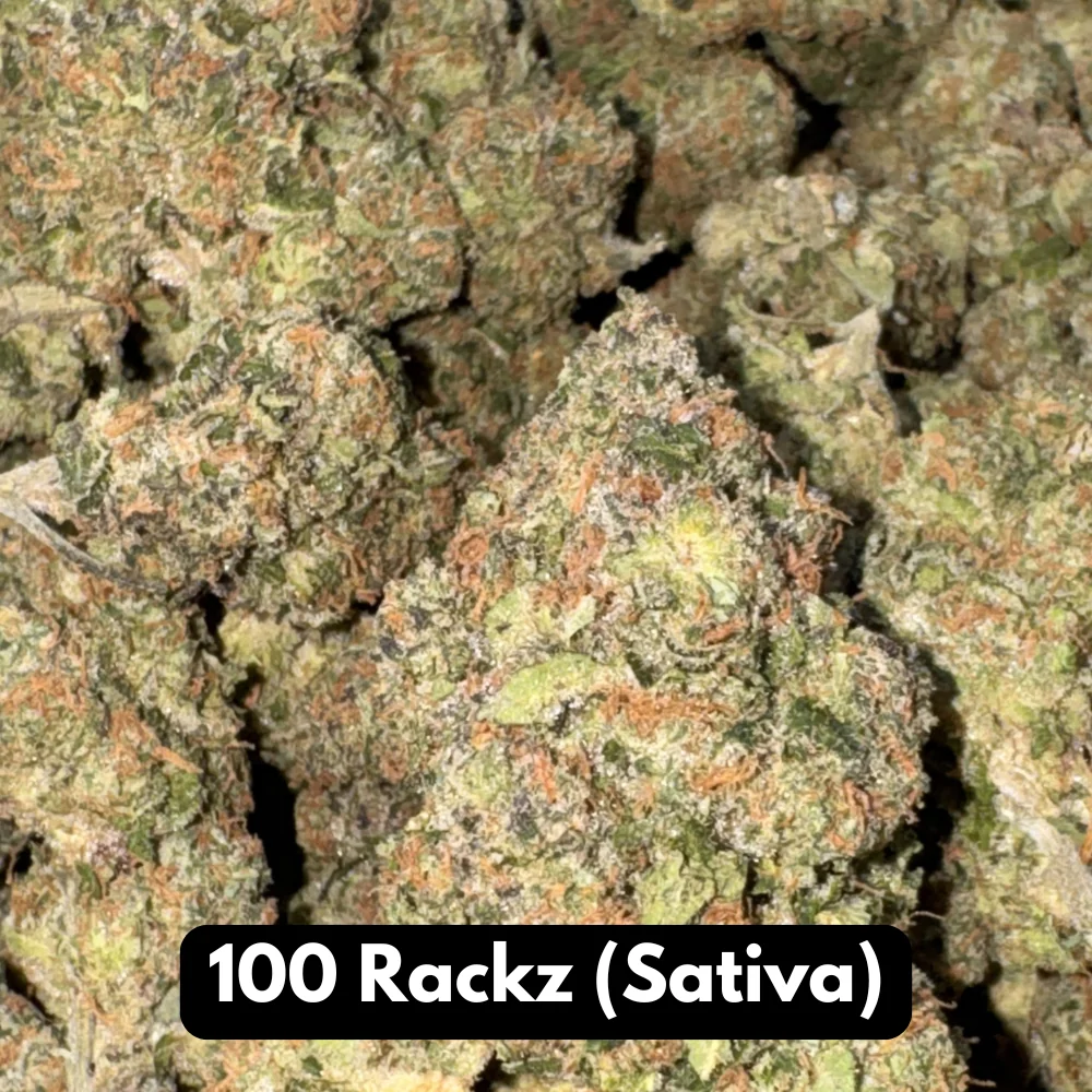 Bulk pile of 100 Rackz sativa THCA flower buds in close-up macro detail